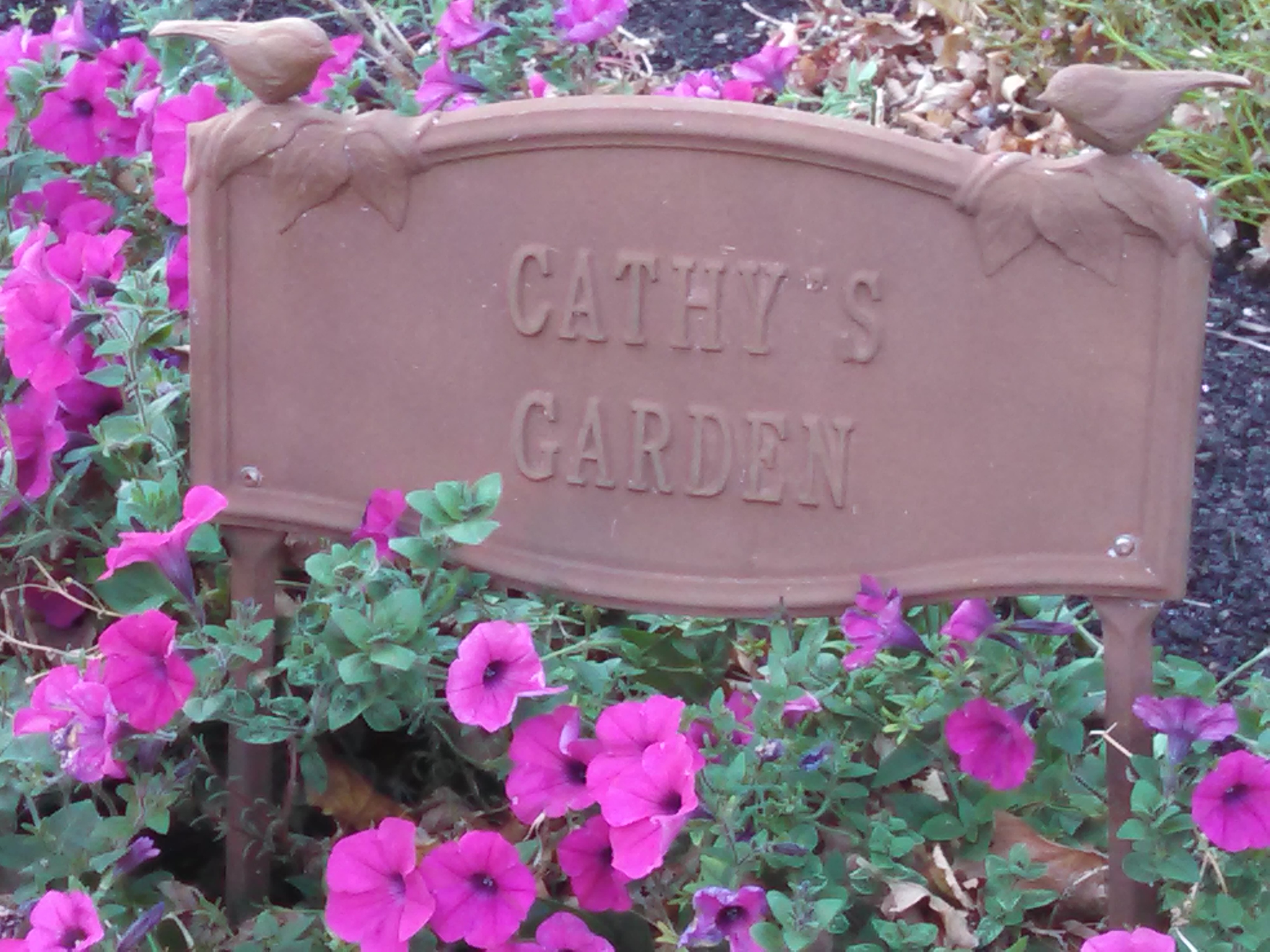 cathys garden sign with flowers