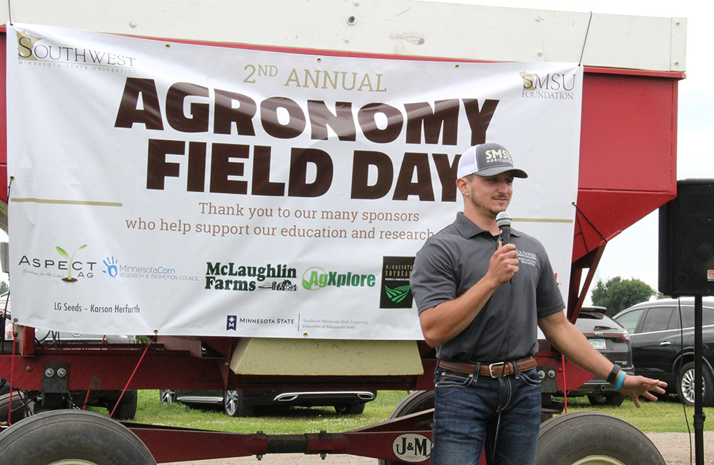 Senior Brock Fox talks to those at the second annual Agronomy Field Day