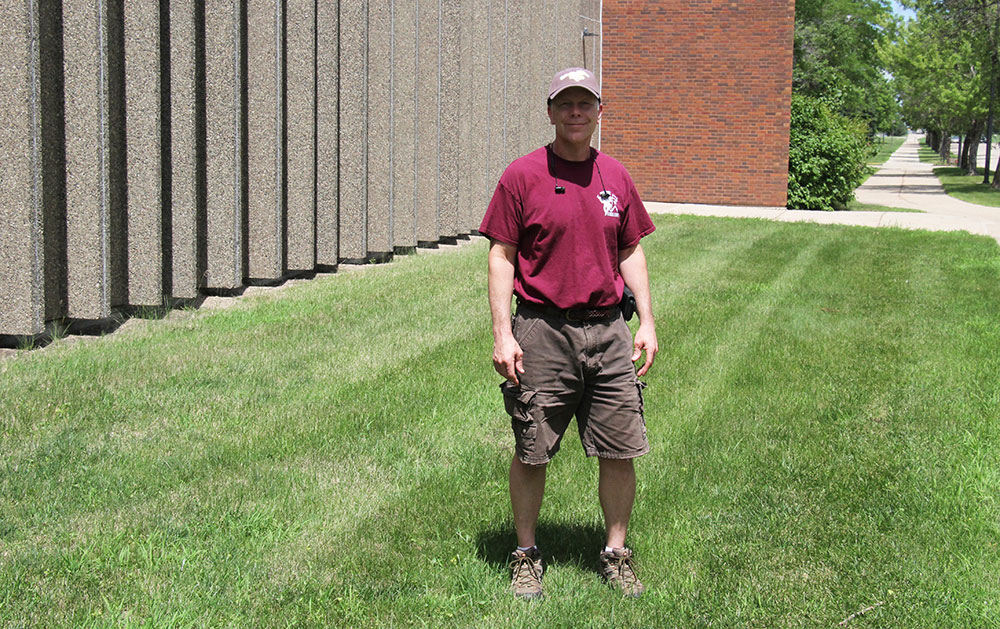 Jeff Jennings stands at the site of the new Fine Arts Entrance Garden