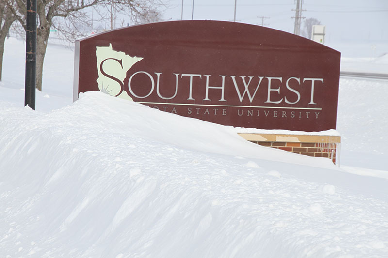 Snow drift in from of an SMSU monument sign