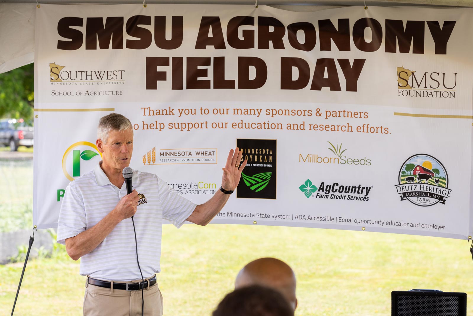 Provost Wastvedt speaking with a microphone