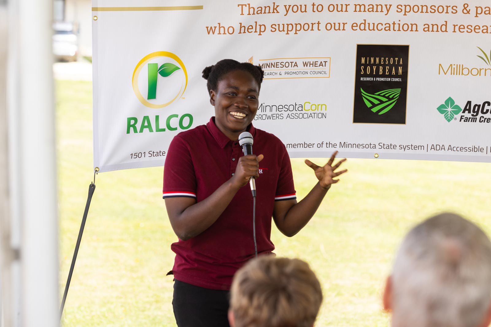 Student Speaking into a microphone