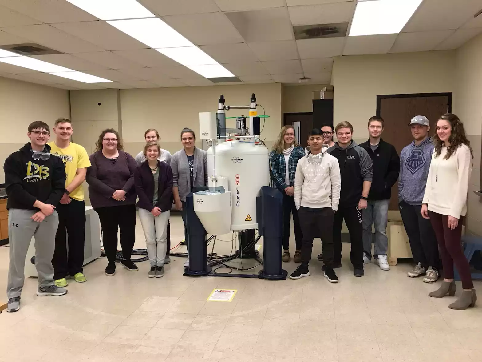 Analytical Chemistry and Food Analysis students using the NMR for their laboratories