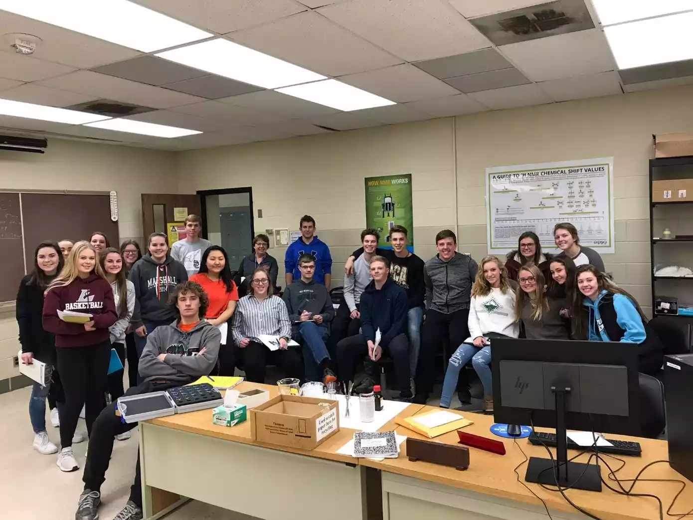 Area high school students trained on the NMR during a field trip to our campus