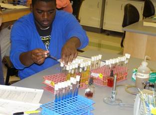 Student working with test tubes
