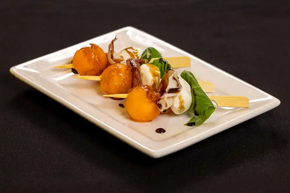 Prosciutto melon caprese skewers