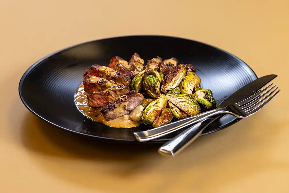 New York Strip with Peppercorn Sauce