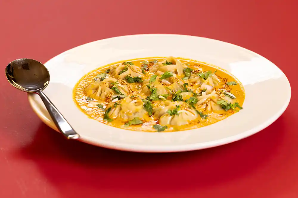 Pork Jhol Momo – Himalayan Dumplings in Spiced Broth 