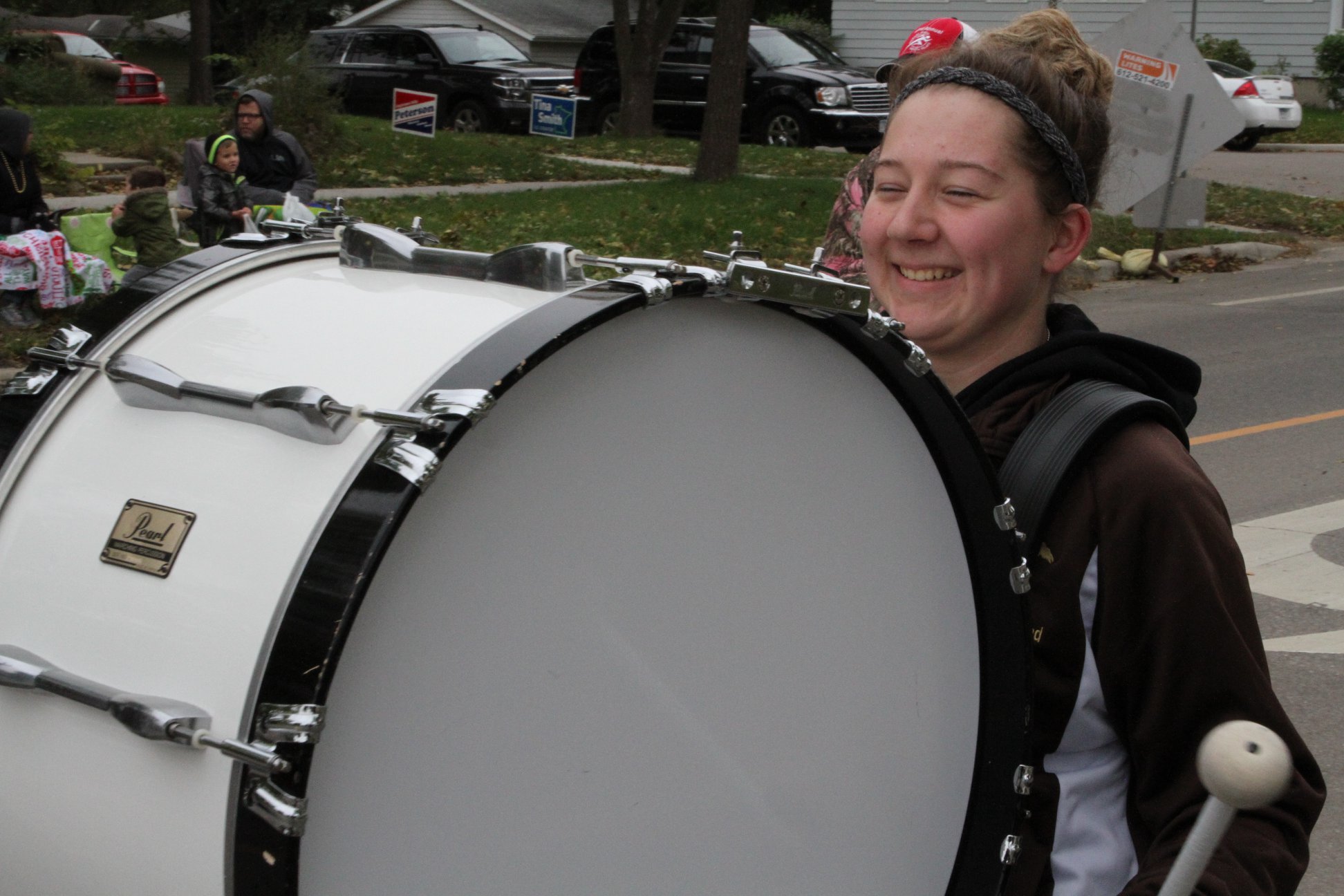 bass drummer in the homecoming parade