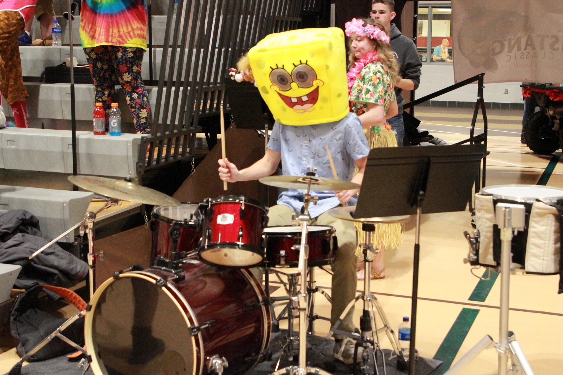 Pep Band drummer in Sponge Bob mask