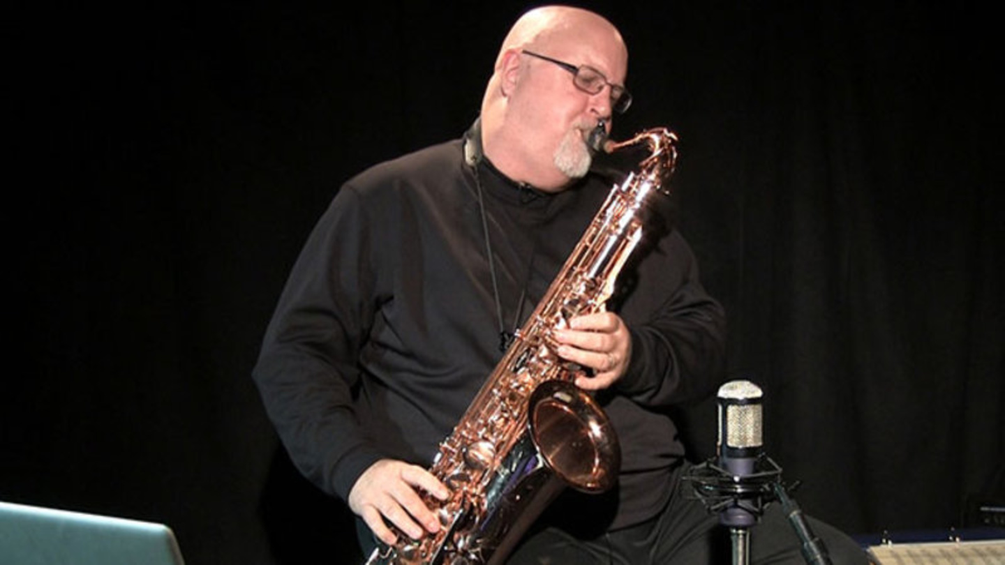 picture of upcoming guest artist, Tom Scott, playing tenor saxophone