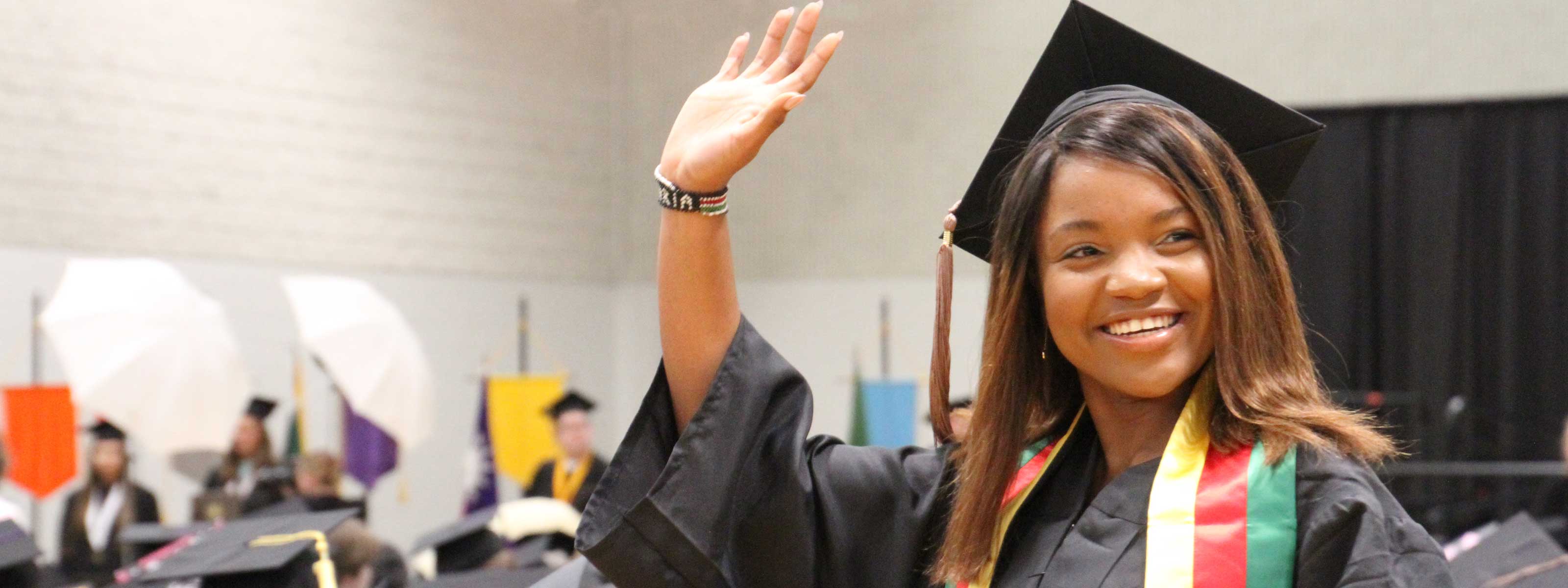 SMSU Graduate Waving