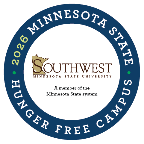 Circular badge on a light gray background recognizing Southwest Minnesota State University as a Hunger Free Campus. A dark blue ring surrounds the design. White text around the ring reads “MINNESOTA STATE” at the top and “HUNGER FREE CAMPUS” at the bottom. The year “2026” appears vertically in yellow-green on the left side of the ring, with small green dots on both sides. In the center is the Southwest Minnesota State University logo, featuring the outline of Minnesota and the word “Southwest,” with the text “Minnesota State University” beneath it. Below the logo, centered text reads: “A member of the Minnesota State system.” The overall design uses dark blue, white, green, and gold tones.