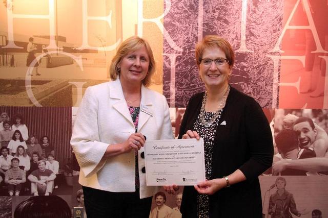 Minnesota West interim President Dr. Barbara McDonald, left, and SMSU President Dr. Connie J. Gores 