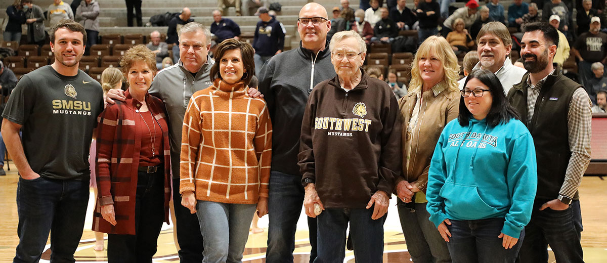 The Denevan family, recognized at a recent men's basketball game.