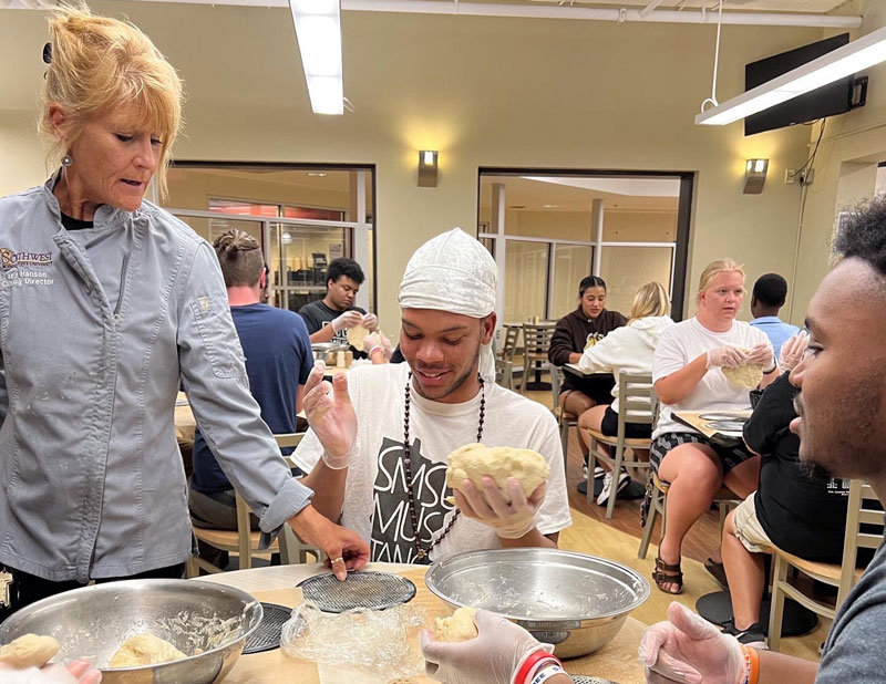 The Residence Life Team enjoying time in the Chartwells Test Kitchen during their August training.