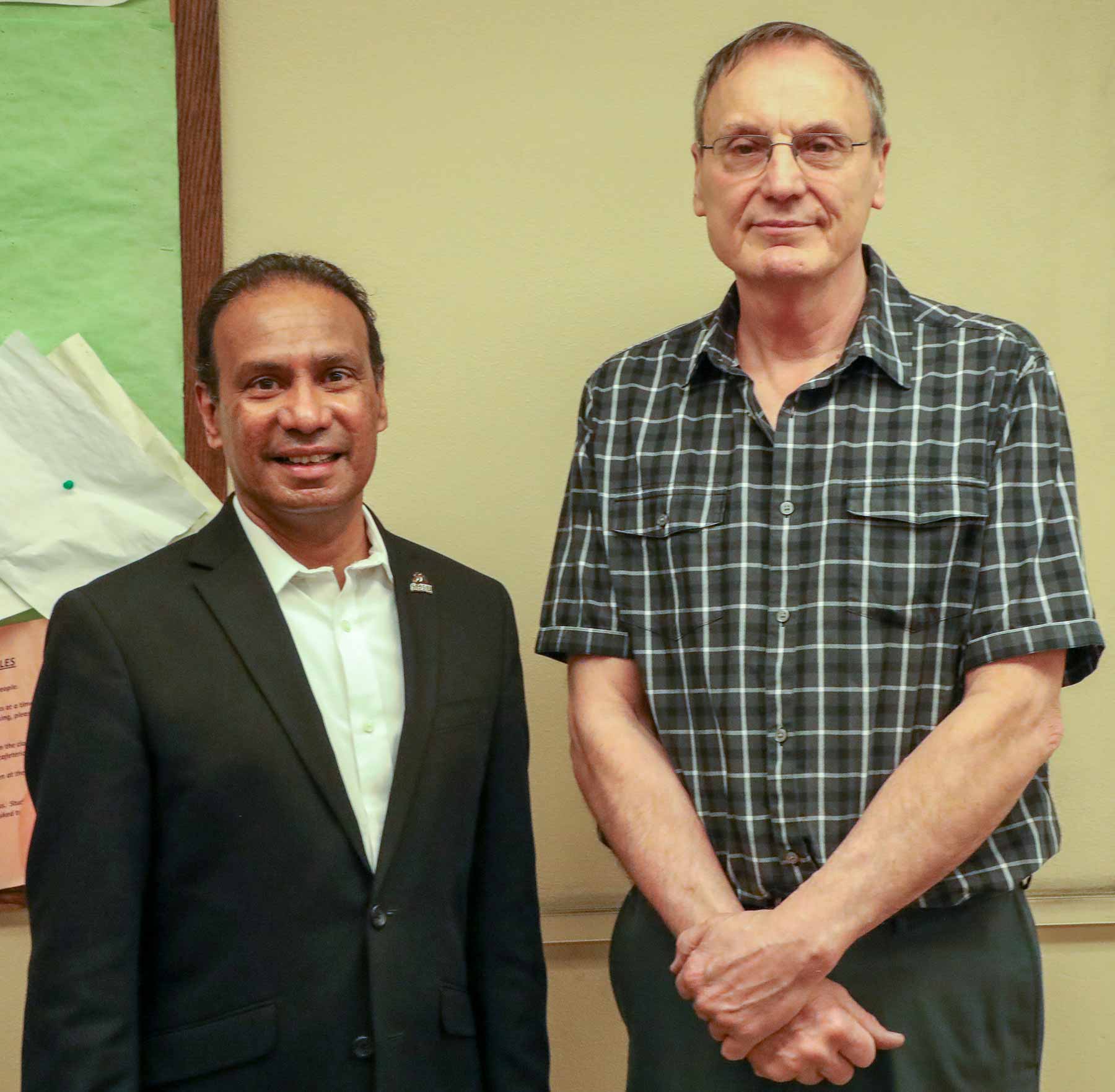 Glenn Bayerkohler, right, with President Kumara Jayasuriya